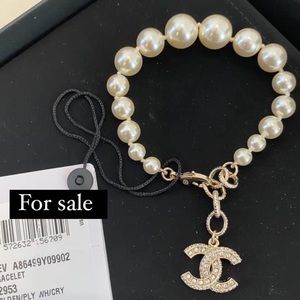 Chanel Classic CC Crystal Charm Pearl Bracelet